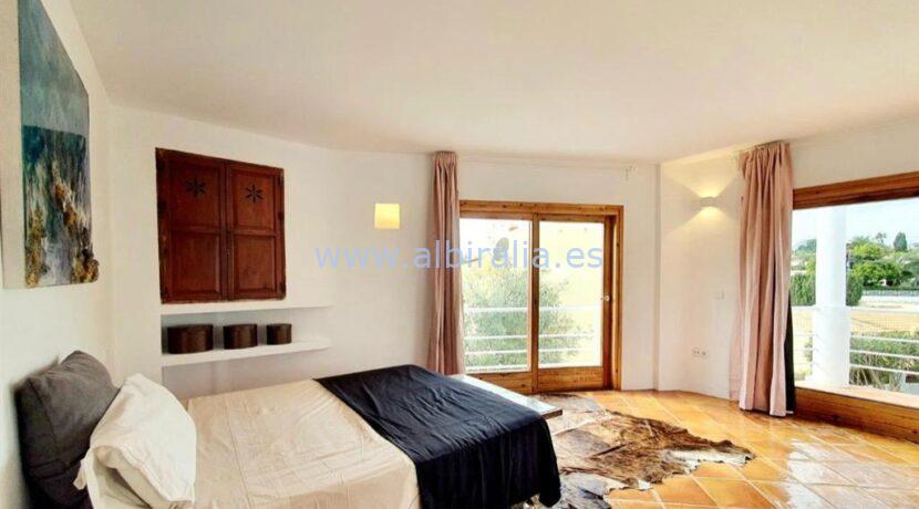 spacious bedroom with in suit bathroom